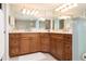 Double vanity bathroom with ample storage at 2675 Gulf Of Mexico Dr # 204, Longboat Key, FL 34228