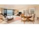 Spacious living room with ocean view and seating area at 2675 Gulf Of Mexico Dr # 204, Longboat Key, FL 34228
