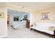 Bright bedroom with ensuite bathroom and comfortable furnishings at 2675 Gulf Of Mexico Dr # 204, Longboat Key, FL 34228