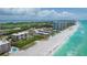 Aerial view of condo building and beach at 2675 Gulf Of Mexico Dr # 204, Longboat Key, FL 34228