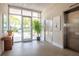 Bright and airy lobby with elevator and plenty of natural light at 2675 Gulf Of Mexico Dr # 204, Longboat Key, FL 34228