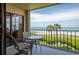 Balcony with ocean view and patio furniture at 2675 Gulf Of Mexico Dr # 204, Longboat Key, FL 34228