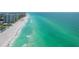 Wide aerial view of coastline, showing condo and beach at 2675 Gulf Of Mexico Dr # 204, Longboat Key, FL 34228
