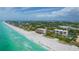 Aerial view of beachfront property and surrounding area at 2675 Gulf Of Mexico Dr # 204, Longboat Key, FL 34228