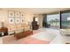 Bright living room with ocean view, comfy seating, and tasteful artwork at 2675 Gulf Of Mexico Dr # 204, Longboat Key, FL 34228
