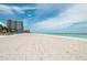 Beachfront view with white sand and ocean at 2675 Gulf Of Mexico Dr # 204, Longboat Key, FL 34228