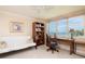 Home office with ocean view, built in shelves, and comfortable seating at 2675 Gulf Of Mexico Dr # 204, Longboat Key, FL 34228