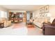 Living room with comfortable seating, large windows, and ocean view at 2675 Gulf Of Mexico Dr # 204, Longboat Key, FL 34228
