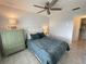 Cozy bedroom with a queen-size bed and ample closet space at 3600 Bal Harbor Blvd # 2-O, Punta Gorda, FL 33950