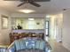 Living room, dining area, and kitchen with an open floor plan at 3600 Bal Harbor Blvd # 2-O, Punta Gorda, FL 33950