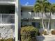 Condo building exterior with landscaping at 3600 Bal Harbor Blvd # 2-O, Punta Gorda, FL 33950