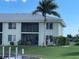 Condo building exterior showcasing waterfront views at 3600 Bal Harbor Blvd # 2-O, Punta Gorda, FL 33950