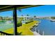 Community pool, tennis courts and canal views from balcony at 3600 Bal Harbor Blvd # 2-O, Punta Gorda, FL 33950