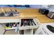 Under-sink storage with cleaning supplies and towels at 3600 Bal Harbor Blvd # 2-O, Punta Gorda, FL 33950