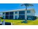 Condo building with water access and lush landscaping at 3600 Bal Harbor Blvd # 2-O, Punta Gorda, FL 33950