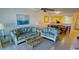 Bright living room with comfortable sofas and a coffee table at 3600 Bal Harbor Blvd # 2-O, Punta Gorda, FL 33950