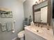 Clean bathroom with a vanity, toilet, and shower at 3600 Bal Harbor Blvd # 2-O, Punta Gorda, FL 33950