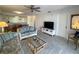 Living room with couches, a coffee table, and a flat-screen TV at 3600 Bal Harbor Blvd # 2-O, Punta Gorda, FL 33950
