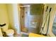 Bathroom with shower and toilet at 3600 Bal Harbor Blvd # 2-O, Punta Gorda, FL 33950