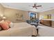 Large main bedroom with king bed and relaxing sitting area at 18189 Ohara Dr, Port Charlotte, FL 33948