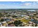 Wide aerial view of house and surrounding community at 18189 Ohara Dr, Port Charlotte, FL 33948