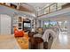 Spacious living room featuring high ceilings, a cozy seating area, and large windows at 18189 Ohara Dr, Port Charlotte, FL 33948