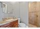 Bathroom with single sink vanity, toilet and shower at 18189 Ohara Dr, Port Charlotte, FL 33948