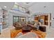 Open living room with high ceilings and access to the pool at 18189 Ohara Dr, Port Charlotte, FL 33948