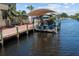 Covered boat lift on private dock at 18189 Ohara Dr, Port Charlotte, FL 33948