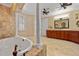 Large bathroom with a soaking tub and walk in shower at 18189 Ohara Dr, Port Charlotte, FL 33948