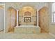 Spa-like bathroom with soaking tub and decorative tile at 18189 Ohara Dr, Port Charlotte, FL 33948