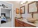 Shared bath with double sinks and granite countertop at 18189 Ohara Dr, Port Charlotte, FL 33948