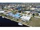 Aerial view of canal front home and neighborhood at 2817 Coral Way, Punta Gorda, FL 33950