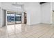 Bright living room with water views and sliding glass doors at 2817 Coral Way, Punta Gorda, FL 33950