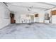 Garage with cabinets and workbench at 2817 Coral Way, Punta Gorda, FL 33950