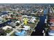 Aerial view of canal front property with surrounding homes and waterways at 2817 Coral Way, Punta Gorda, FL 33950