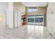 Open living area with kitchen and patio access at 2817 Coral Way, Punta Gorda, FL 33950