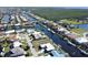 Waterfront lot with canal access and neighboring homes at 2817 Coral Way, Punta Gorda, FL 33950