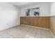 Small bedroom with tiled floor at 2817 Coral Way, Punta Gorda, FL 33950