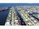 Aerial view of a waterfront home situated in a canal-front community at 2817 Coral Way, Punta Gorda, FL 33950