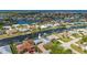 Aerial view of a waterfront home in a canal community at 103 Tropicana Dr, Punta Gorda, FL 33950