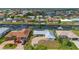 Elevated perspective of the property and the surrounding waterfront neighborhood at 103 Tropicana Dr, Punta Gorda, FL 33950