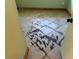 Dirty tiled floor with dark markings at 103 Tropicana Dr, Punta Gorda, FL 33950