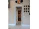 Bright hallway with access to other rooms in the house at 2761 Newman Dr, North Port, FL 34288