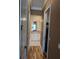 Long hallway with access to bedroom, bathroom and closet at 2761 Newman Dr, North Port, FL 34288