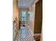 Bathroom with soaking tub, walk in shower and hardwood floors at 2761 Newman Dr, North Port, FL 34288