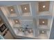 Detailed coffered ceiling with recessed lighting and a ceiling fan at 2761 Newman Dr, North Port, FL 34288