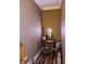 Small vanity area with a lighted mirror and storage at 2761 Newman Dr, North Port, FL 34288