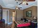 Spacious bedroom with hardwood floors and ensuite bathroom at 2761 Newman Dr, North Port, FL 34288