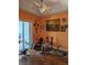 Home gym with exercise equipment and wood floors at 2761 Newman Dr, North Port, FL 34288